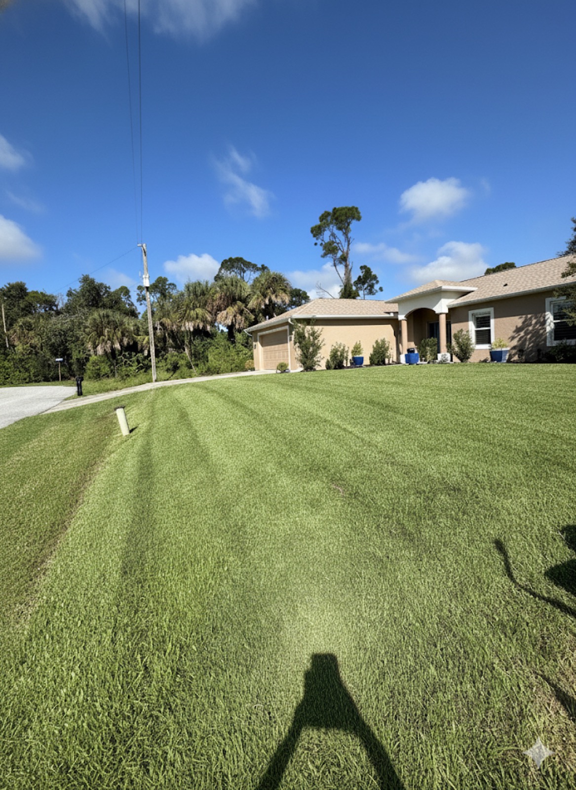 Professional lawn mowing service in North Port FL — precision striped lawn